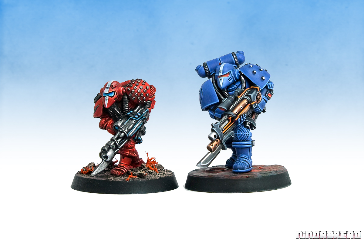 LE02 original Space Marine Blood Angel alongside the 30th Anniversary Imperial Space Marine Ultramarines